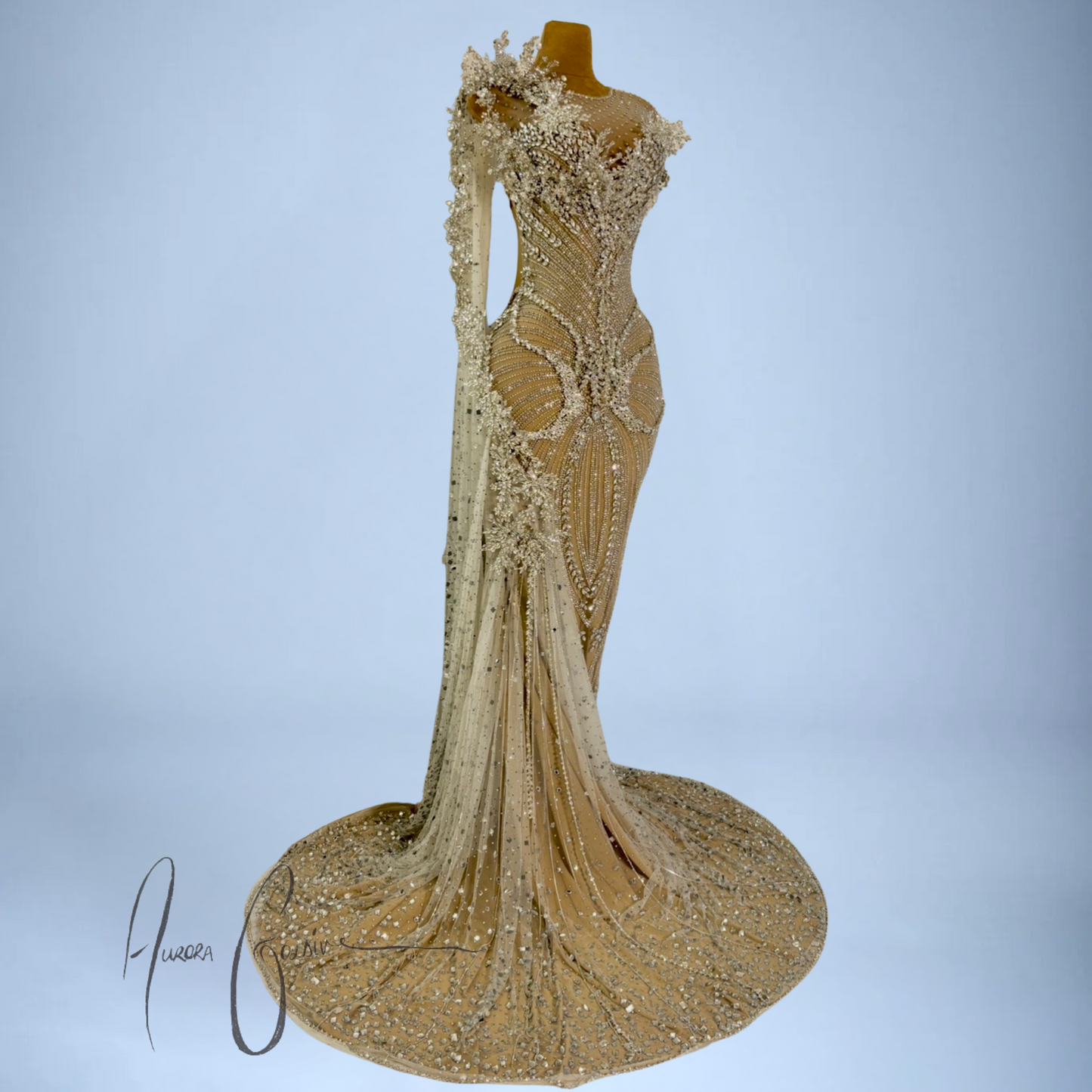 Close-up of floral hand-beading and gemstone detailing on Aurienne gown’s bodice and shoulder drape