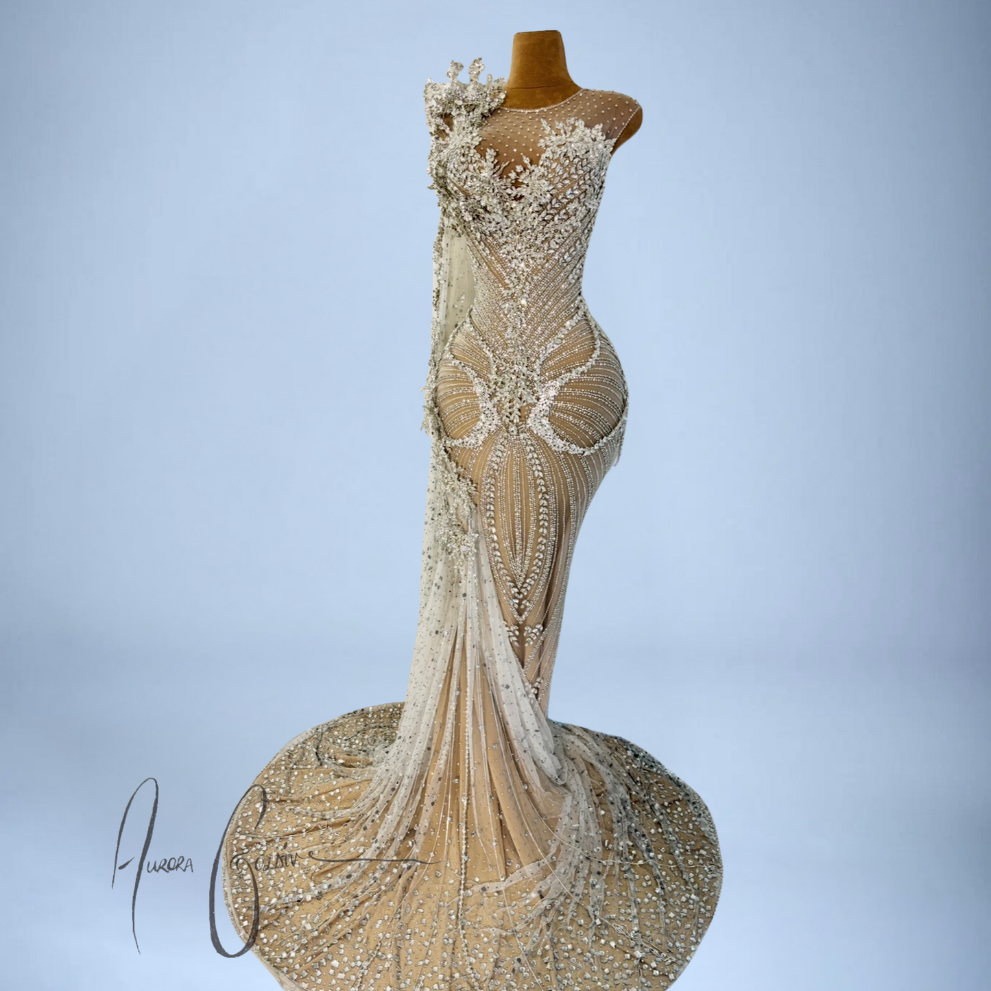 Front-facing view of Aurienne hand-beaded mermaid dress with dramatic trailing rhinestone veil